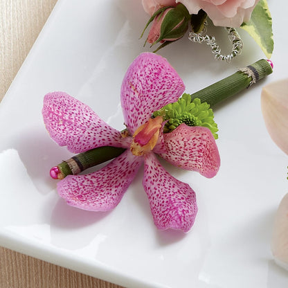 Pink Mokara Boutonniere –  Sanford Floral Marketing, Sanford FL